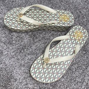 Thick tall Tory Burch flip flops